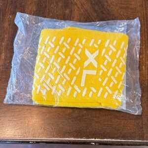 Yellow XL skid resistant slipper socks brand new